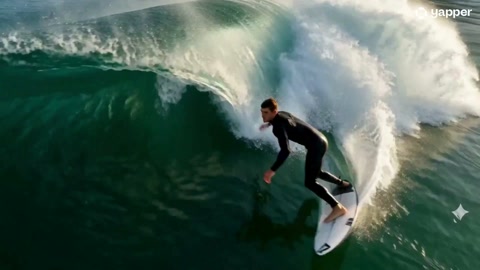 Surfer 360 Aerial Spin on Emerald Wave