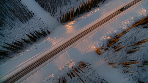 Silver Cybertruck in Snowy Sunset