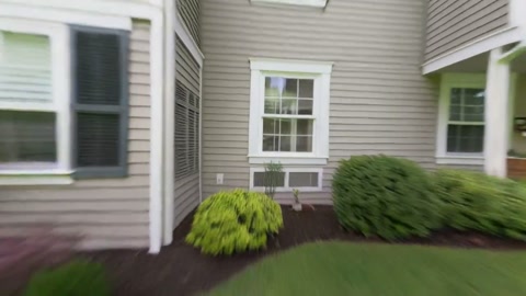 Wide Exterior Shot Past Suburban House