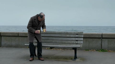 Elderly Man Seafront Bench